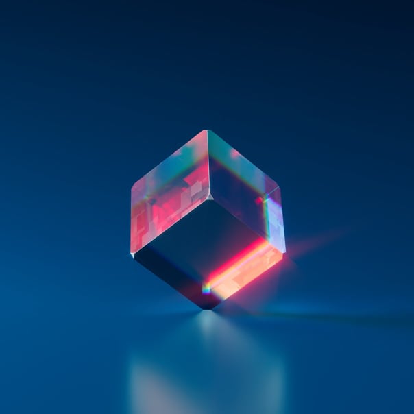 A cube shaped crystal in a blue background tilted at 45 degrees angle anticlockwise.